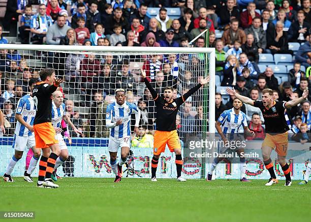 Sheffield Wednesday react after an illegal tackle during the Sky Bet Championship match between Huddersfield Town and Sheffield Wednesday at John...