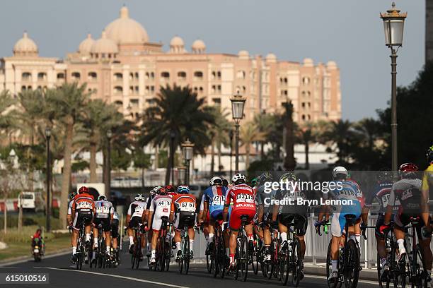 Members of the chasing group ride during the Elite Men's Road Race on day eight of the UCI Road World Championships on October 16, 2016 in Doha,...