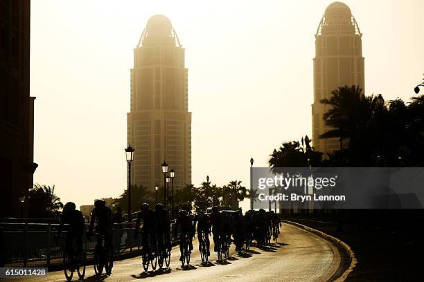 Members of the peloton ride during the Elite Men's Road Race on day eight of the UCI Road World Championships on October 16, 2016 in Doha, Qatar.