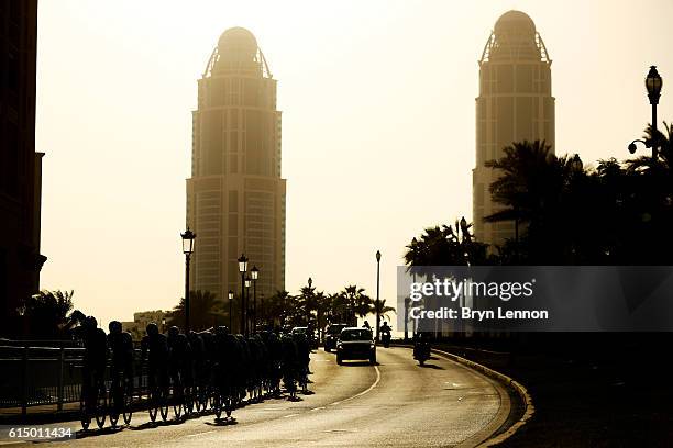 Members of the peloton ride during the Elite Men's Road Race on day eight of the UCI Road World Championships on October 16, 2016 in Doha, Qatar.