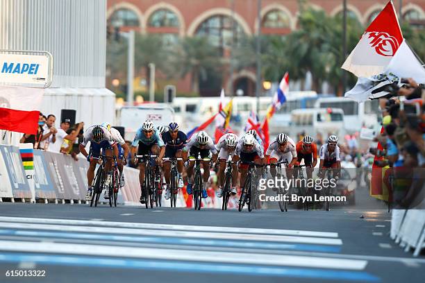 Peter Sagan of Slovakia leads Mark Cavendish of Great Britain and Tom Boonen of Belgium as they approach the finish line of the Elite Men's Road Race...