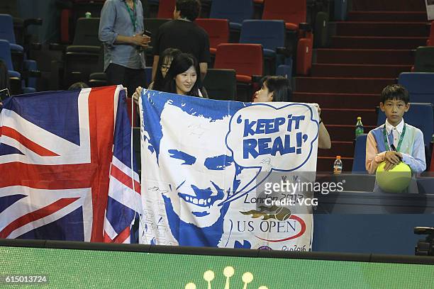Fans hold a post of Andy Murray during the Men's singles final match between Andy Murray of Great Britain and Roberto Bautista Agut of Spain on day 8...