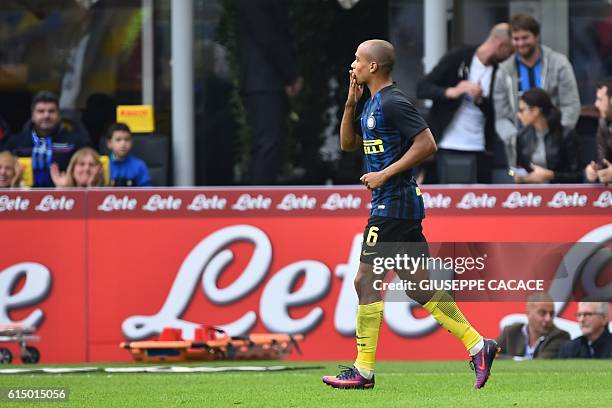 Inter Milan's midfielder from Portugal Joao Mario celebrates after scoring during the Italian Serie A football match Inter Milan vs Cagliari at "San...