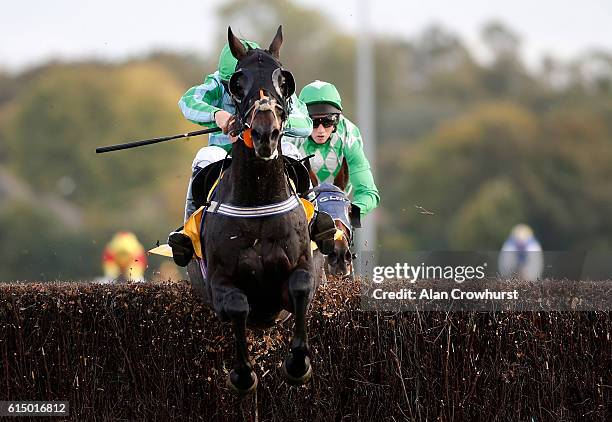 Matt Griffiths riding Best Boy Barney clear the last to win The Read Paul Nicholls Exclusively At Betfair Handicap Steeple Chase at Kempton Park on...