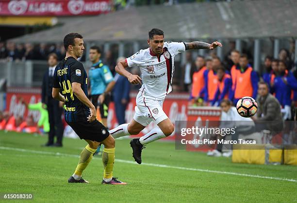 Ivan Peresic of FC Internazionale competes for the ball with Marco Borriello of Cagliari Calcio during the Serie A match between FC Internazionale...