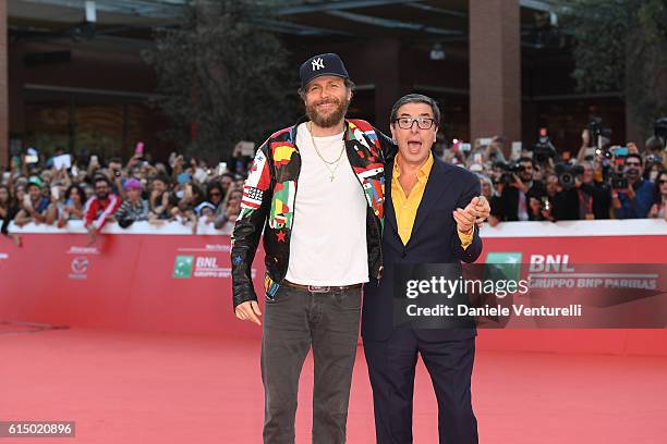 Jovanotti and Antonio Monda walk a red carpet during the 11th Rome Film Festival at Auditorium Parco Della Musica on October 16, 2016 in Rome, Italy.