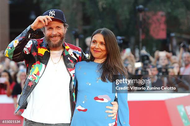 Jovanotti and Francesca Valiani walk a red carpet during the 11th Rome Film Festival at Auditorium Parco Della Musica on October 16, 2016 in Rome,...