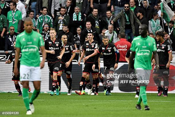 Dijon's French midfielder Pierre Lees-Melou celebrates after scoring a goal during the French L1 football match AS Saint-Etienne vs Dijon on October...
