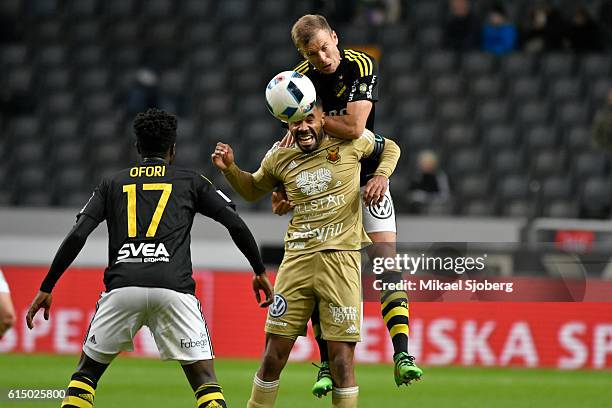 Per Karlsson of AIK and Alex Dyer of Ostersunds FK during the allsvenskan match between AIK and Ostersunds FK at Friends arena on October 16, 2016 in...