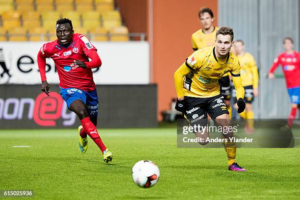 Lalawele Atakora of Helsingborgs IF and Adam Lundqvist of IF Elfsborg competes for the ball during the Allsvenskan match between IF Elfsborg and...