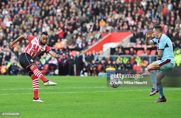 Nathan Redmond of Southampton shoots past Dean Marney of Burnley to score their second goal during the Premier League match between Southampton and...