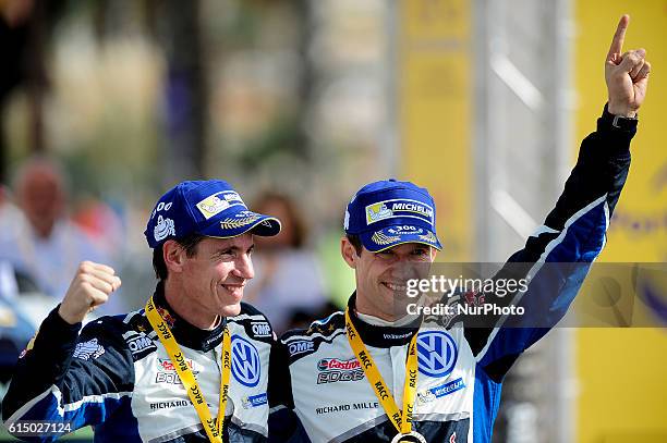 The French driver Sbatien Ogier, and his co-driver Julien Ingrassia of Volkswagen Motorsport, celebrating their 4th World Rally Championship victory,...