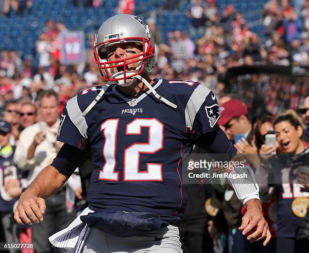 Tom Brady of the New England Patriots reacts before the game against the Cincinnati Bengals at Gillette Stadium on October 16, 2016 in Foxboro,...
