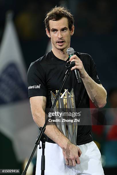 Andy Murray of Great Britain speaks with his trophy during the award ceremony after winning the Men's singles final match against Roberto Bautista...