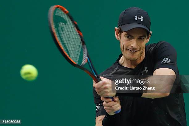 Andy Murray of Great Britain returns a shot against Roberto Bautista Agut of Spain during men's singles final match on day eight of Shanghai Rolex...