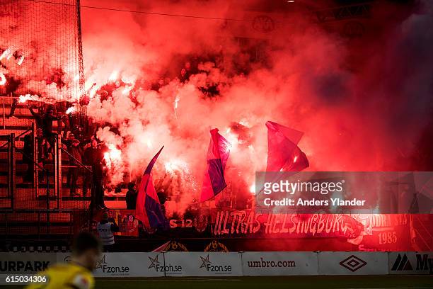 Fans of Helsingborgs IF burning flairs prior the Allsvenskan match between IF Elfsborg and Helsingborgs IF at Boras Arena on October 16, 2016 in...