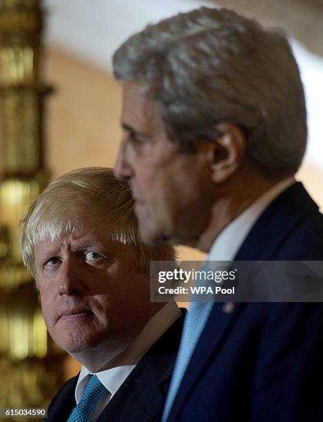 British Foreign Secretary Boris Johnson and US Secretary of State John Kerry give a joint press conference after a meeting on the situation in Syria...