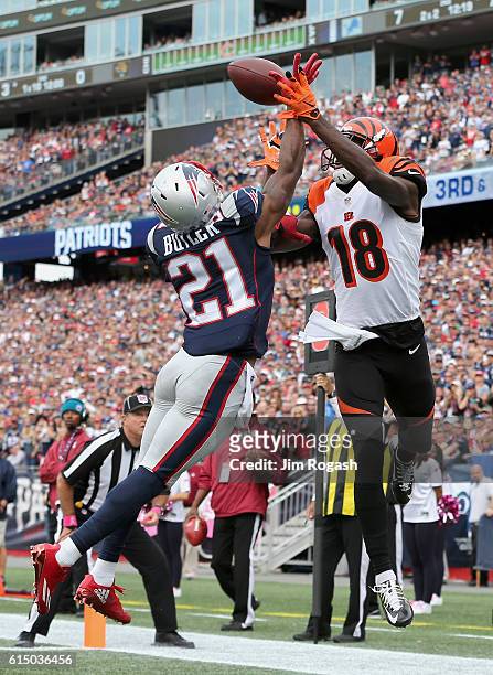 Malcom Butler of the New England Patriots blocks the pass to A.J. Green of the Cincinnati Bengals during the game at Gillette Stadium on October 16,...