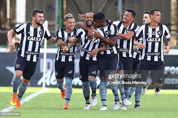 Players of Botafogo celebrate a scored goal against Atletico Mineiro during a match between Botafogo and Atletico Mineiro as part of Brasileirao...
