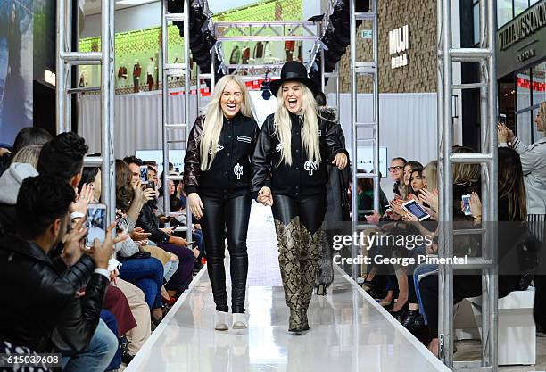 Sam Beckerman and Calli Beckerman walk the runway during Mackage Fall 2016 collection during Toronto FashionCAN 2016 at Yorkdale Shopping Centre on...