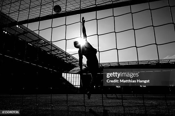 Goalkeeper Jonas Loessl of Mainz saves a ball during the Bundesliga match between 1. FSV Mainz 05 and SV Darmstadt 98 at Opel Arena on October 16,...