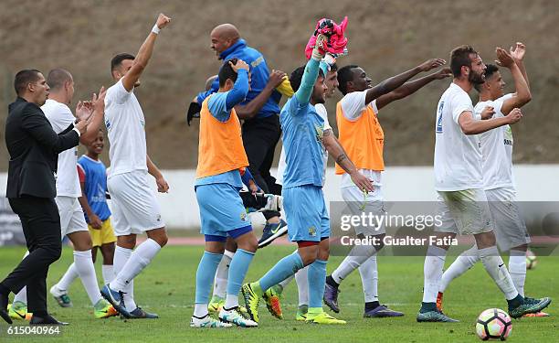 Real Sport Club's players and staff celebrate the victory with supporters at the end of the Portuguese Cup match between Real Sport Club and FC...