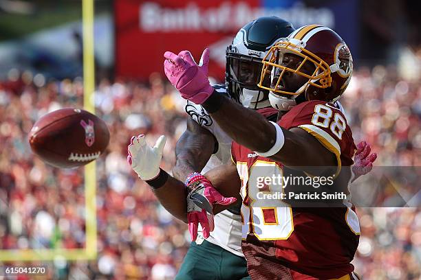 Wide receiver Pierre Garcon of the Washington Redskins misses a catch while free safety Jalen Mills of the Philadelphia Eagles defends in the third...