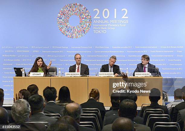 Japan - International Monetary Fund officials hold a press conference in Tokyo on Oct. 9, 2012 on the outlook for the world economy. The IMF and...