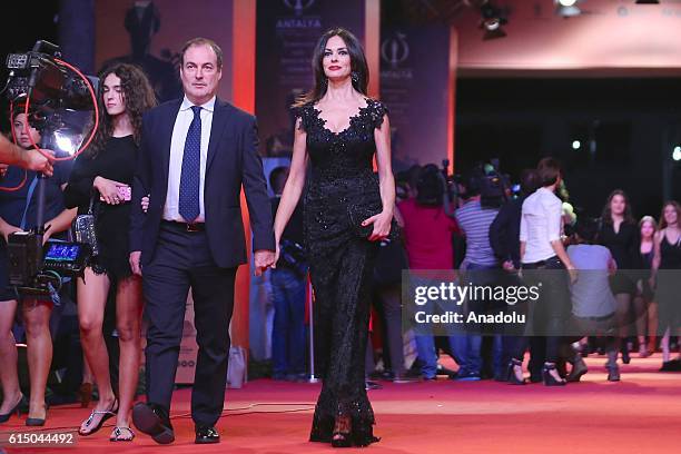 Giulio Violati and Maria Grazia Cucinotta attend a red carpet ceremony during the 53rd International Antalya Film Festival, at the EXPO 2016 in...