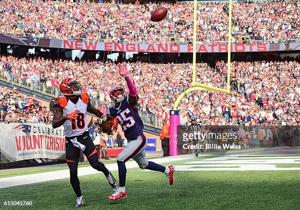 Eric Rowe of the New England Patriots blocks a pass intended for A.J. Green of the Cincinnati Bengals during the fourth quarter of a game at Gillette...