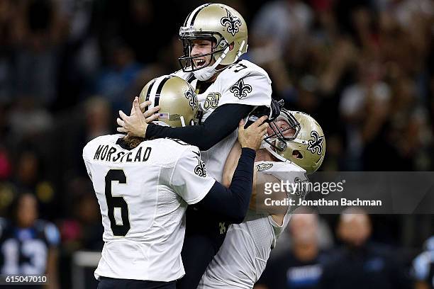 Wil Lutz of the New Orleans Saints celebrates after kicking the game winning field goal during the second half of a game against the Carolina...