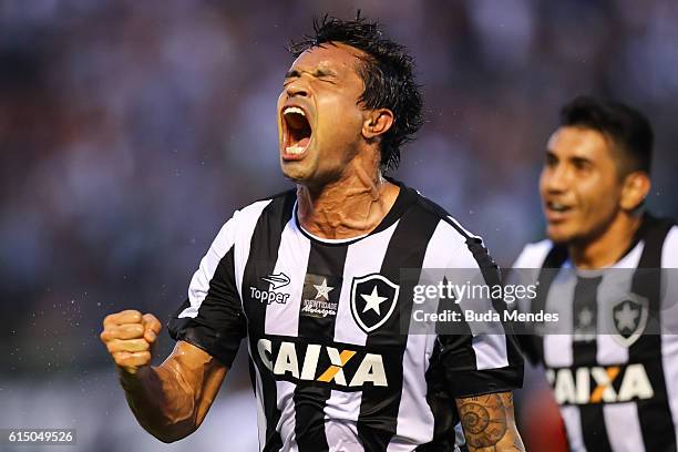Dudu Cearense of Botafogo celebrates a scored goal against Atletico Mineiro during a match between Botafogo and Atletico Mineiro as part of...