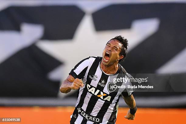 Dudu Cearense of Botafogo celebrates a scored goal against Atletico Mineiro during a match between Botafogo and Atletico Mineiro as part of...