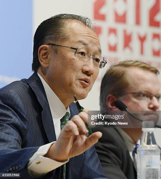 Japan - World Bank President Jim Yong Kim speaks at a press conference on Oct. 11, 2012 in Tokyo, where annual meetings of the International Monetary...