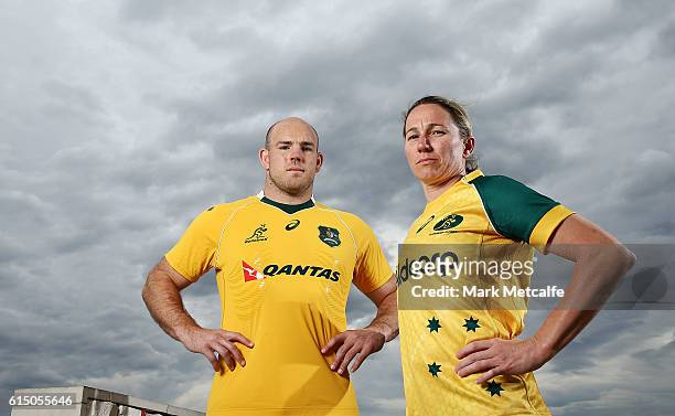 Wallabies captain Stephen Moore and Wallaroos captain Ash Hewson pose during an ARU Media Opportunity at the Intercontinental Double Bay on October...