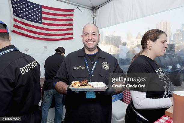 Winners of both the Coke and Smoke BBQ Challenge and Thrillist's People's Choice Award Chef Matthew Katakis and team members for The Butcher Bar...