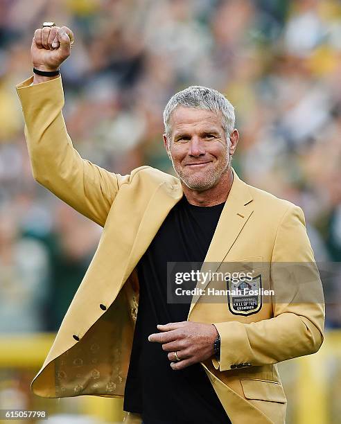 Former NFL quarterback Brett Farve is inducted into the Ring of Honor during a halftime ceremony during the game between the Green Bay Packers and...