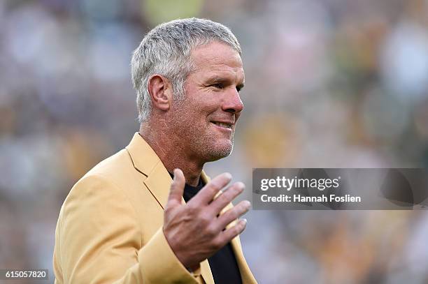 Former NFL quarterback Brett Farve is inducted into the Ring of Honor during a halftime ceremony during the game between the Green Bay Packers and...