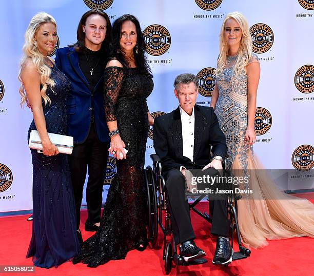 Inductee Randy Travis and guests arrive at the 2016 Medallion Ceremony at the Country Music Hall of Fame and Museum on October 16, 2016 in Nashville,...