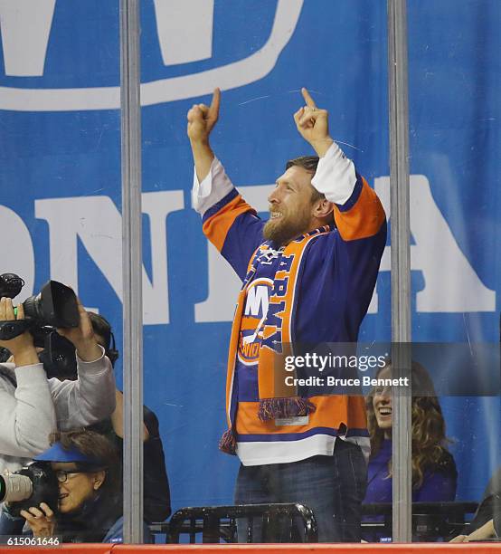 Daniel Bryan of the WWE leads the "Yes yes yes" chants during the game between the New York Islanders and the Anaheim Ducks at the Barclays Center on...