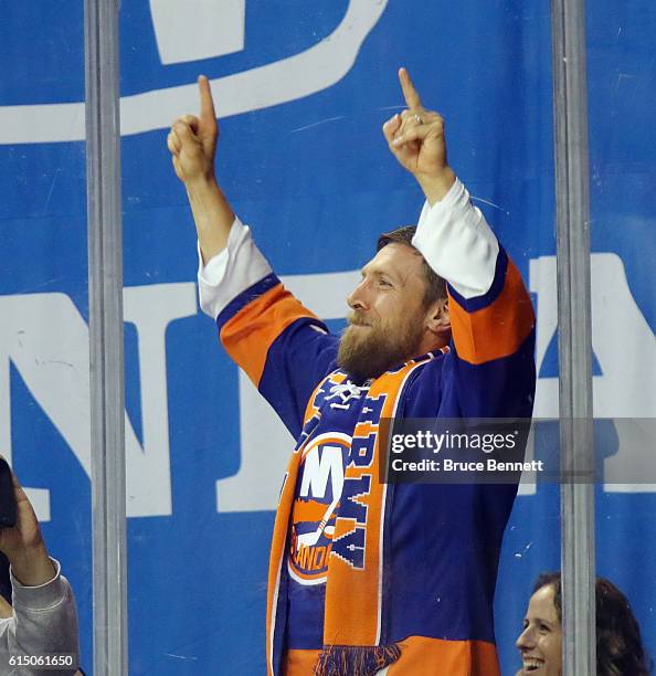 Daniel Bryan of the WWE leads the "yes, yes, yes" chants during the game between the New York Islanders and the Anaheim Ducks at the Barclays Center...