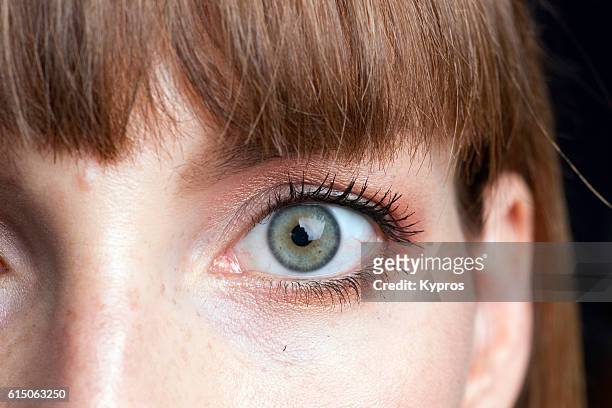 young woman's eye close-up - eyeshadow foto e immagini stock