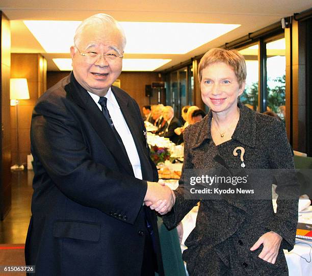 France - Laurence Parisot , head of the French confederation of business enterprises, and Hiromasa Yonekura, chairman of the Japan Business...