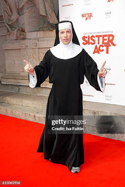 German moderator Oliver Pocher disguised as nun attends the 'Sister Act: The Musical' premiere at Stage Theater on October 16, 2016 in Berlin,...