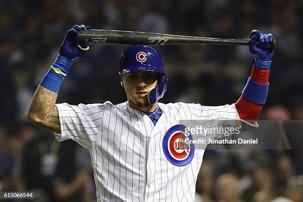 Javier Baez of the Chicago Cubs reacts after striking out in the second inning against the Los Angeles Dodgers during game two of the National League...