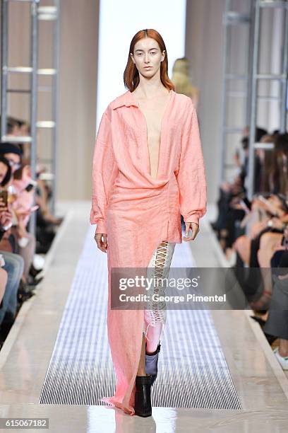 Model walks the runway wearing Mikhael Kale Spring and Summer 2017 collection during FashionCAN at Yorkdale Shopping Centre on October 16, 2016 in...