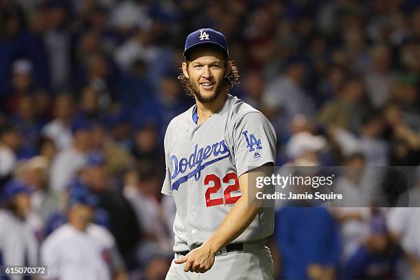 Clayton Kershaw of the Los Angeles Dodgers walks off the field after pitching the seventh inning against the Chicago Cubs during game two of the...