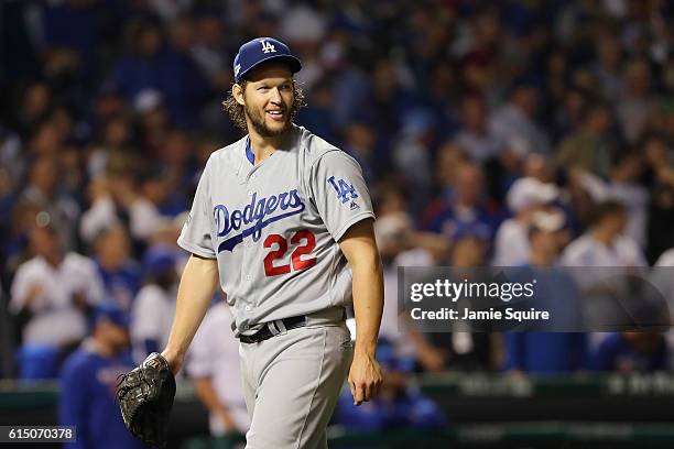 Clayton Kershaw of the Los Angeles Dodgers walks off the field after pitching the seventh inning against the Chicago Cubs during game two of the...