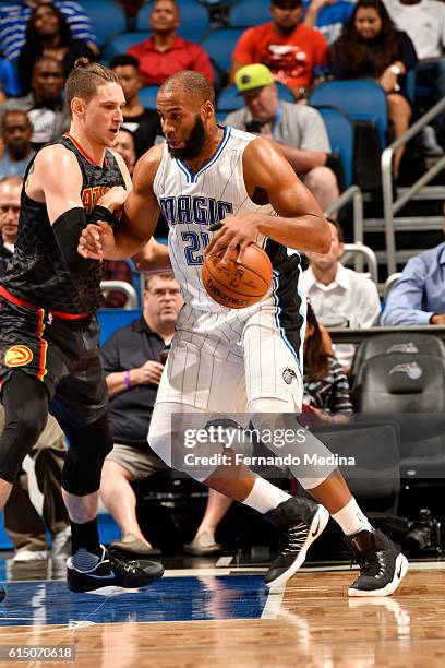 Arinze Onuaku of the Orlando Magic handles the ball during a preseason game against the Atlanta Hawks on October 16, 2016 at Amway Center in Orlando,...