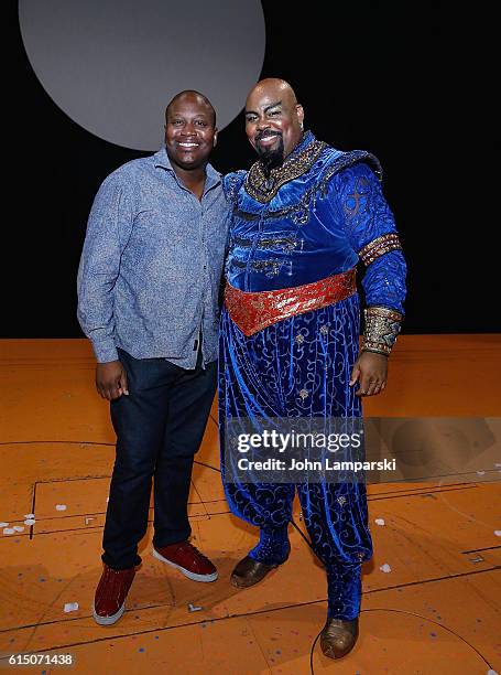 Titus Burgess and James Monroe Iglehart pose during "Aladdin" on Broadway at New Amsterdam Theatre on October 16, 2016 in New York City.